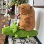 MASKOTKI kapibara jadąca na krokodylu 30CM